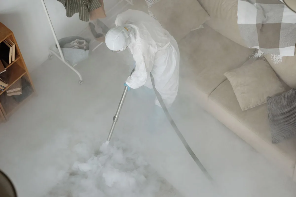 Biohazard cleanup technician in protective equipment, Union City, TN